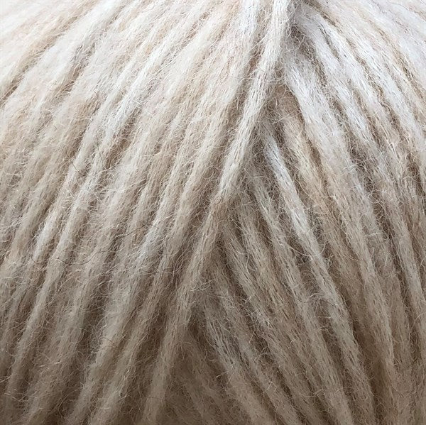 Closup van bol snefnug natur creme alpaca