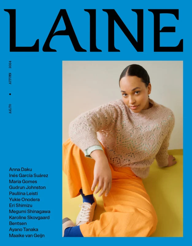 cover van Laine magazine 22 met een dame in een gebreide lace sweater